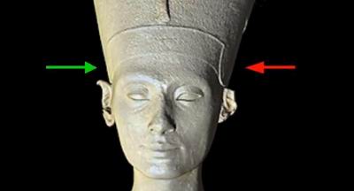 The crown sits askew on the Nefertiti’s head